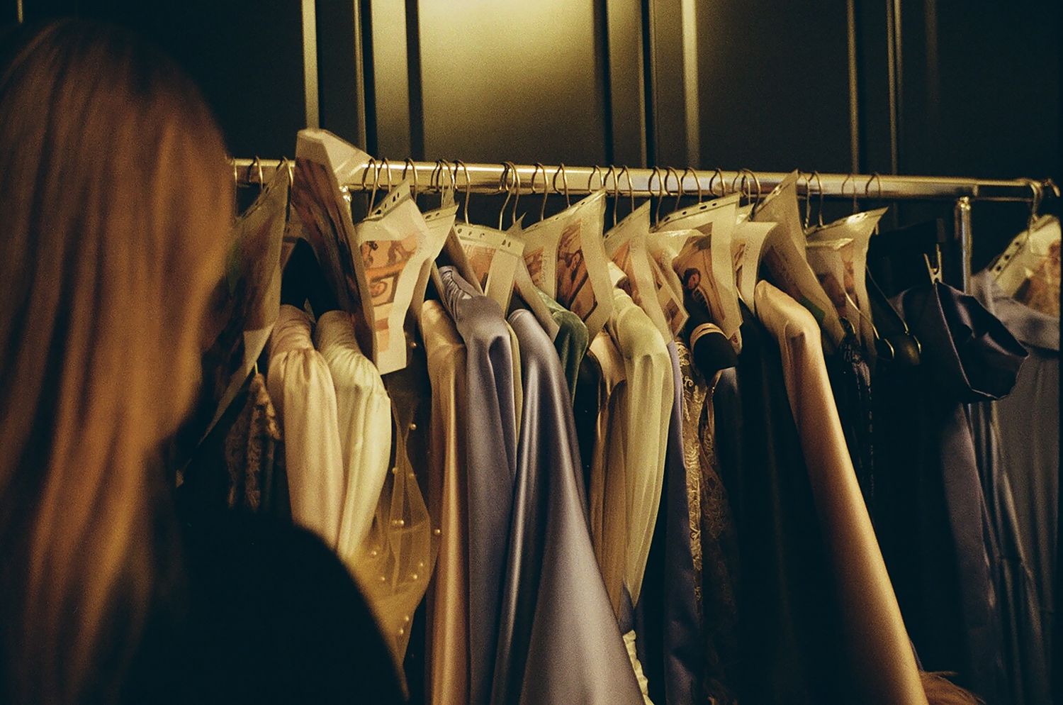 Racks of couture gowns inside the Exquisite Gowns salon